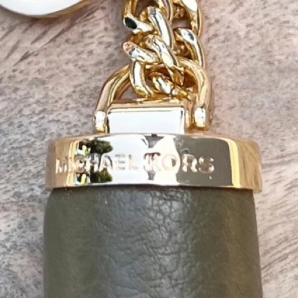 Michael Kors large tassel on chain